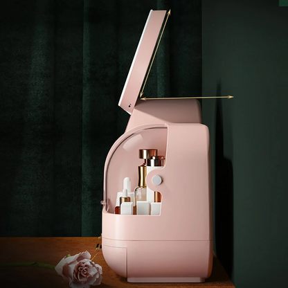 boite rangement maquillage rose posee sur table